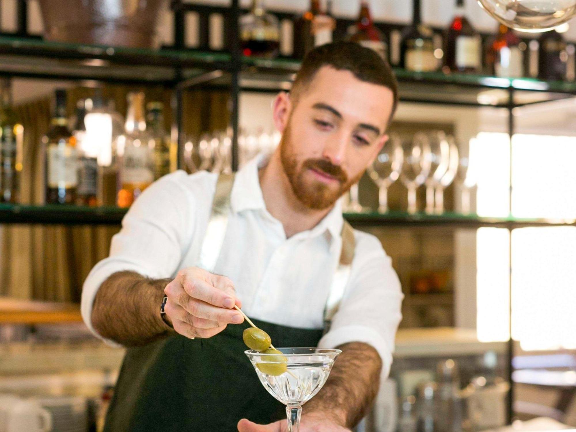The Sebel Quay West Suites Сидней Экстерьер фото A bartender at work