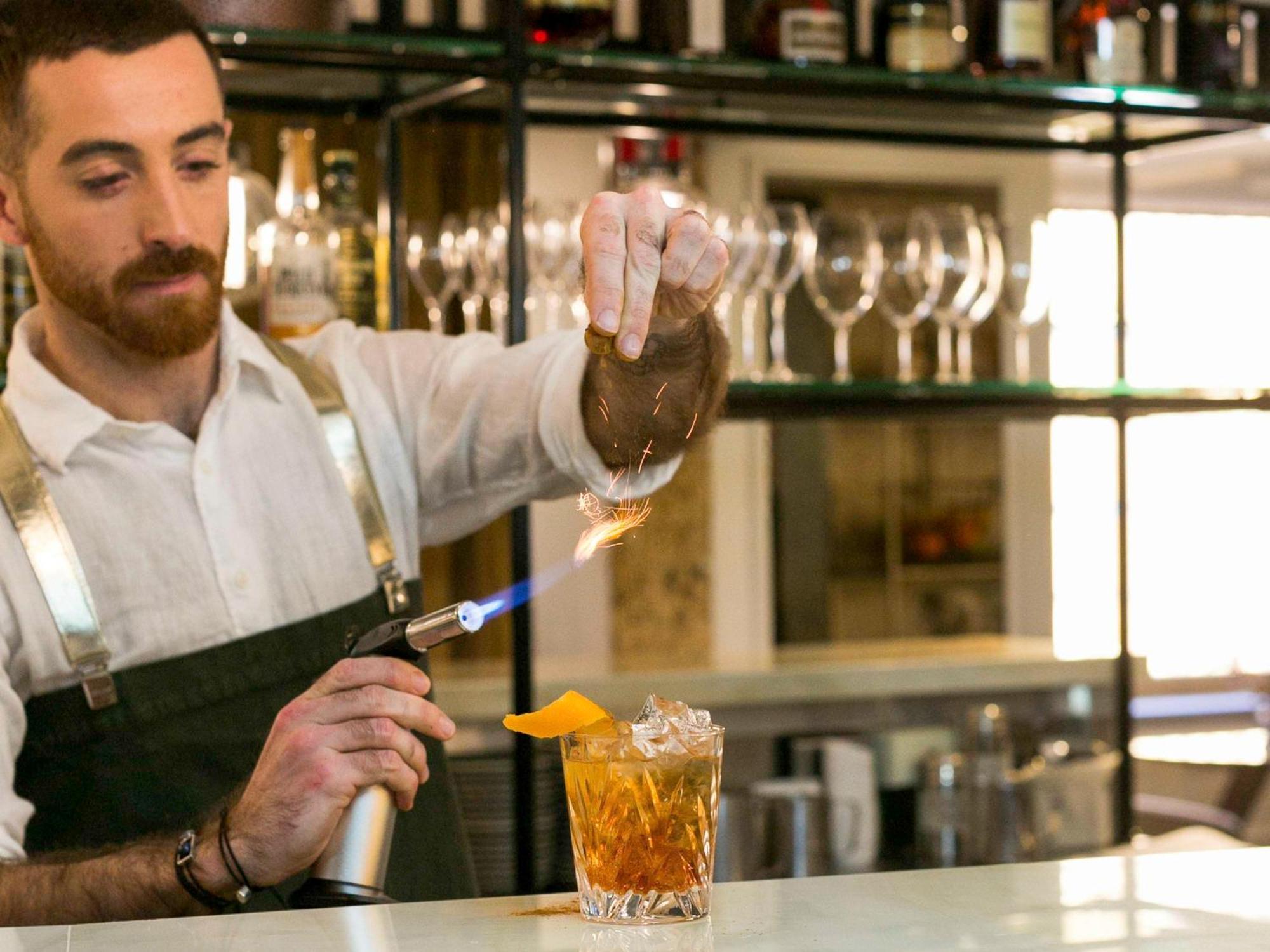 The Sebel Quay West Suites Сидней Экстерьер фото A bartender preparing a cocktail