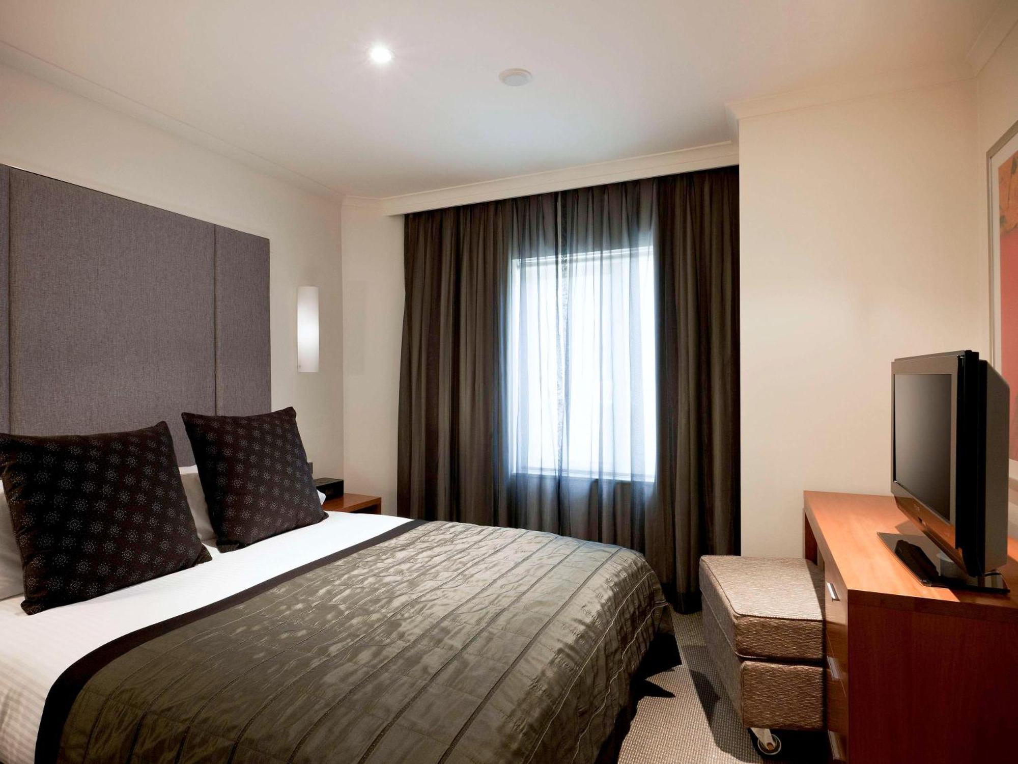 The Sebel Quay West Suites Сидней Экстерьер фото A bedroom at the hotel
